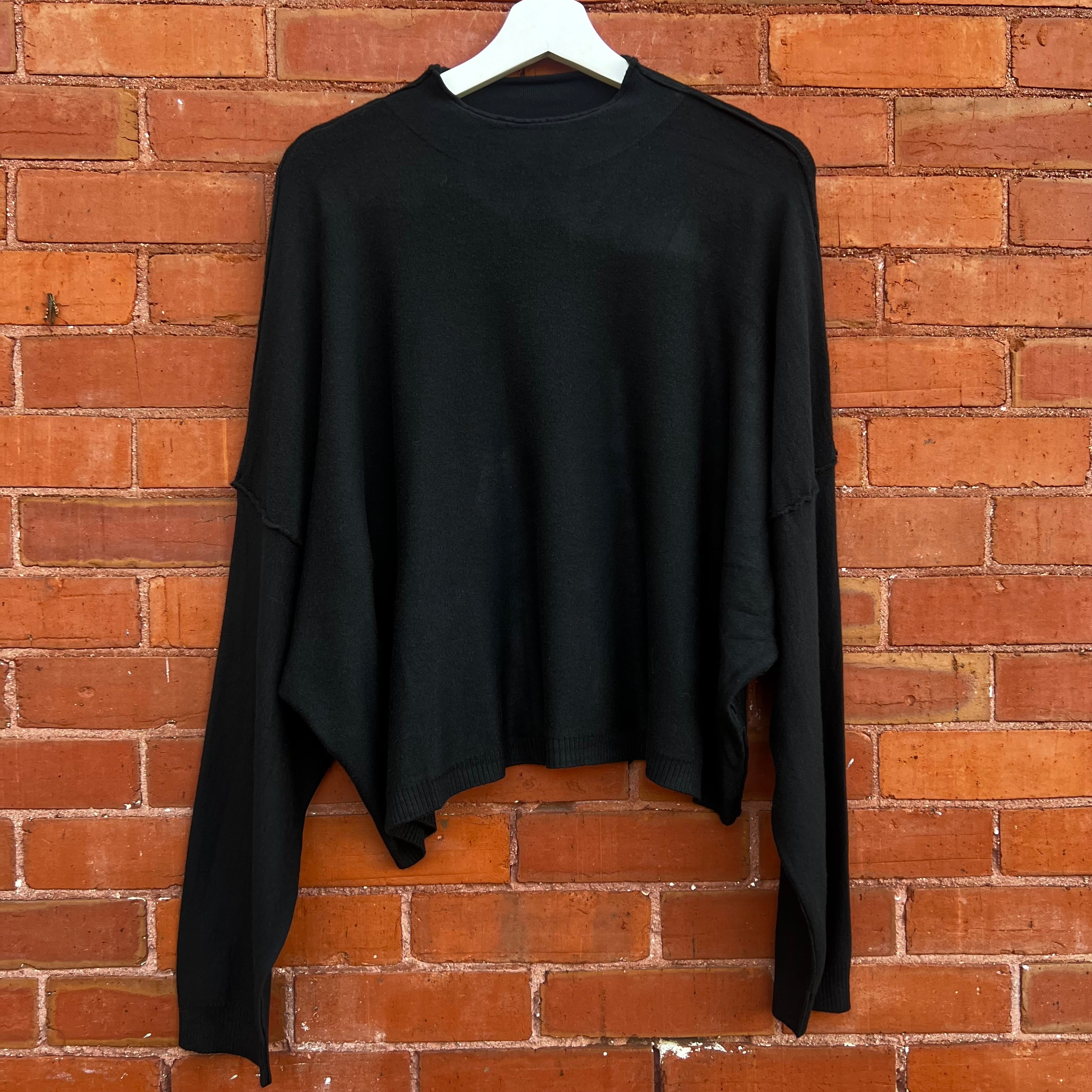 The Kelley High Neck Sweater In Black