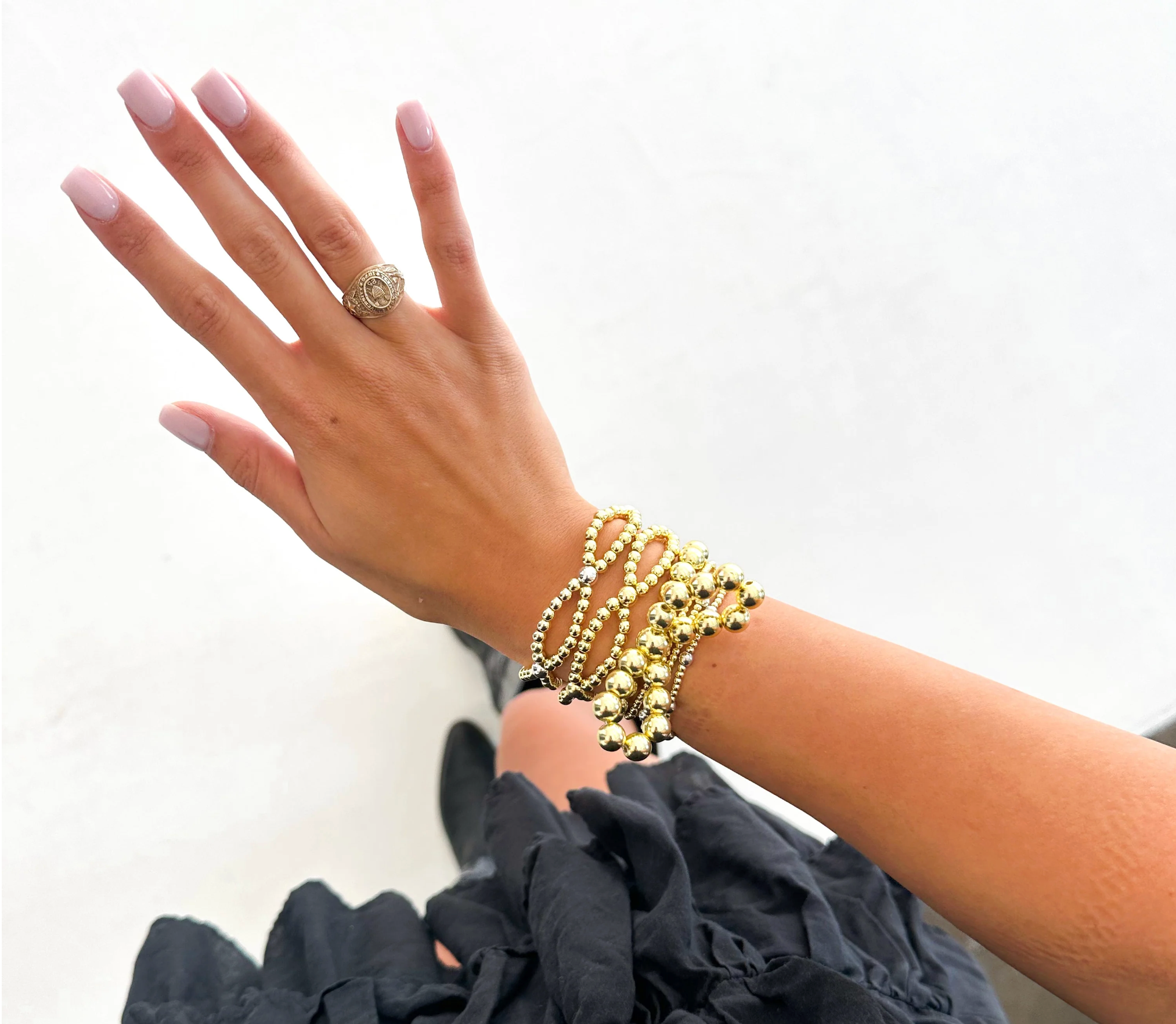 The Infinity Knot Bracelet In Silver + Gold